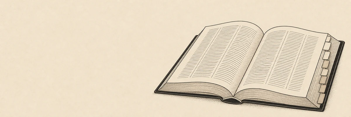 An open dictionary beside a row of index tabs